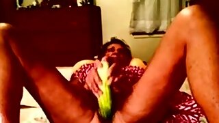 Granny amateur using a thick cucumber, cuming..